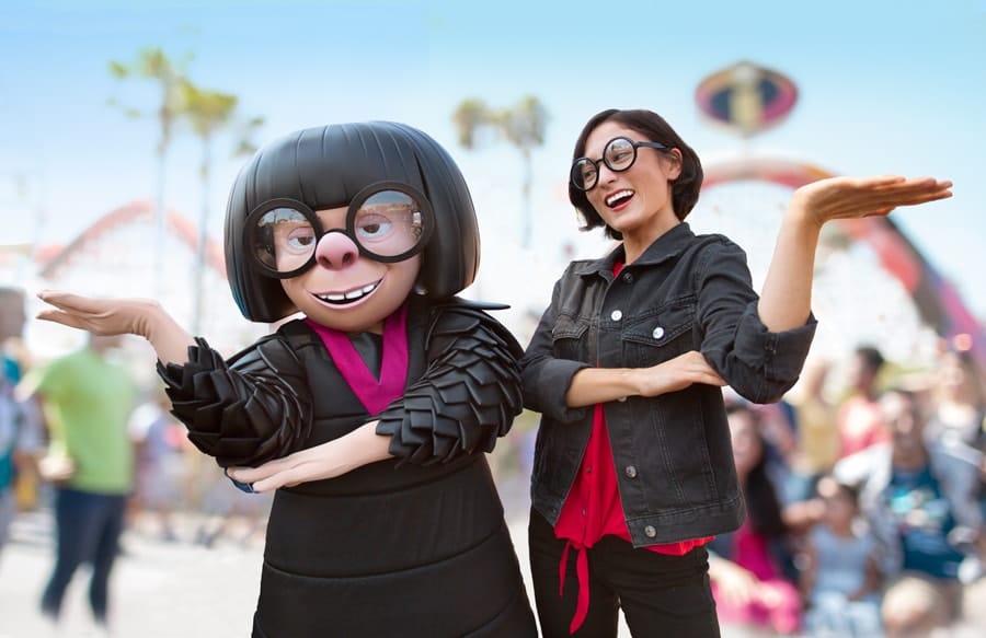 Edna Mode (“The Incredibles”) posing with a guest