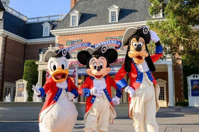 Donald Duck, Mickey Mouse and Goofy dress in their patriotic best to celebrate the Fourth of July at Walt Disney World Resort