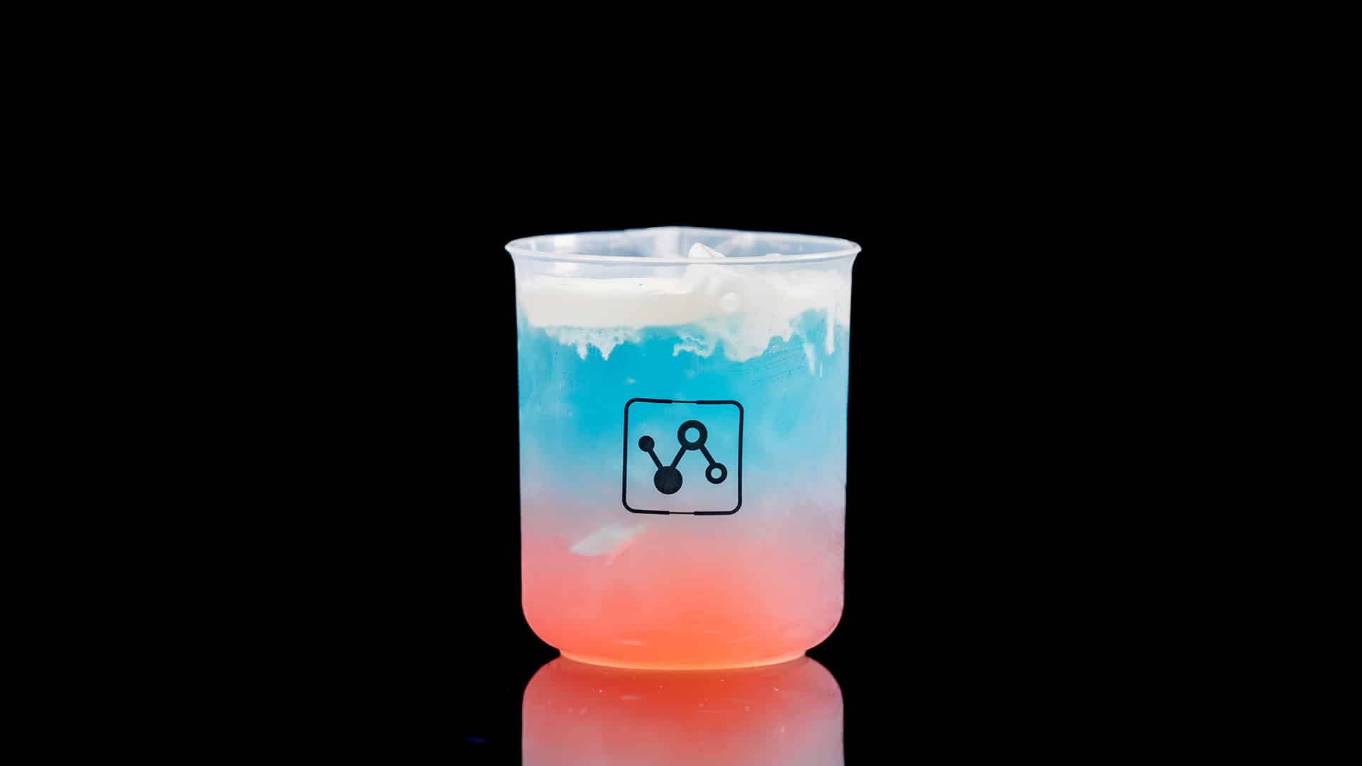 Liberty Punch: Litmus Lemonade layered with blue Hawaiian and topped with citrus meringue foam