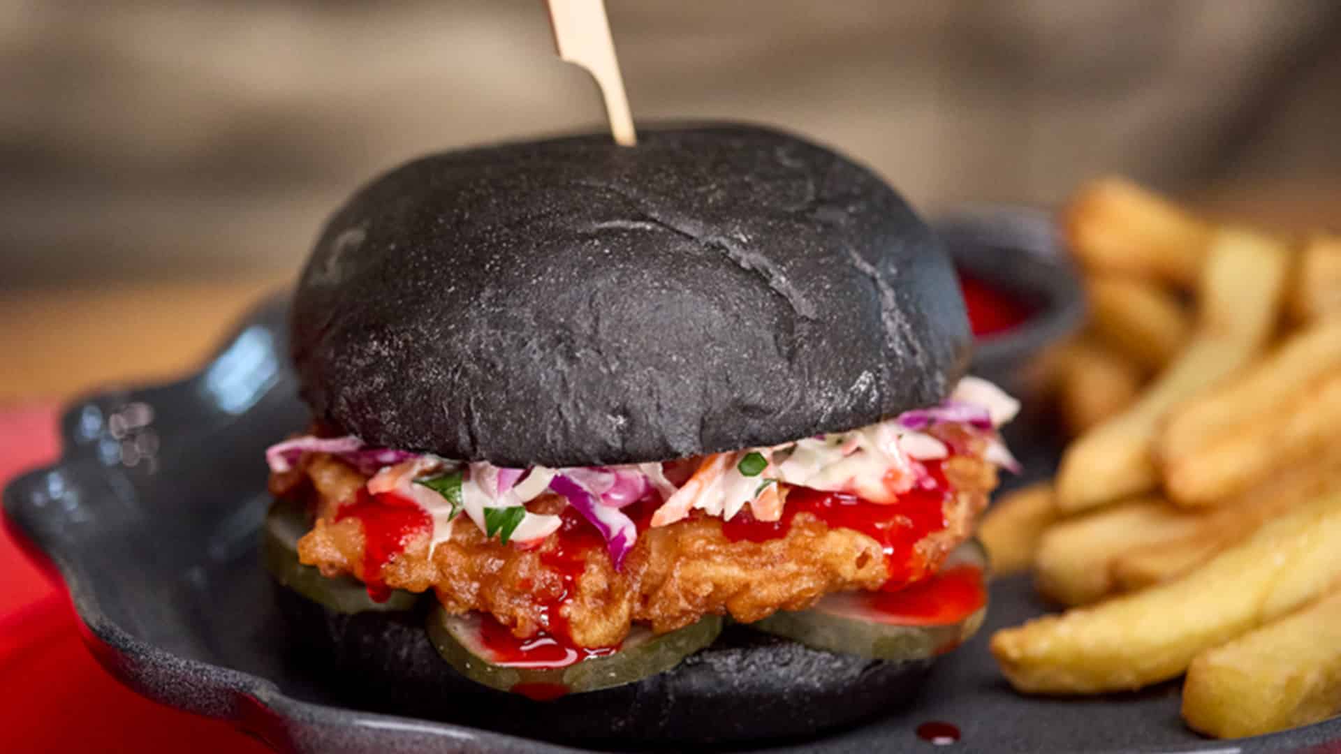 Blood Orange Chicken Sandwich at Das Stakehaus in Dark Universe at Universal Epic Universe