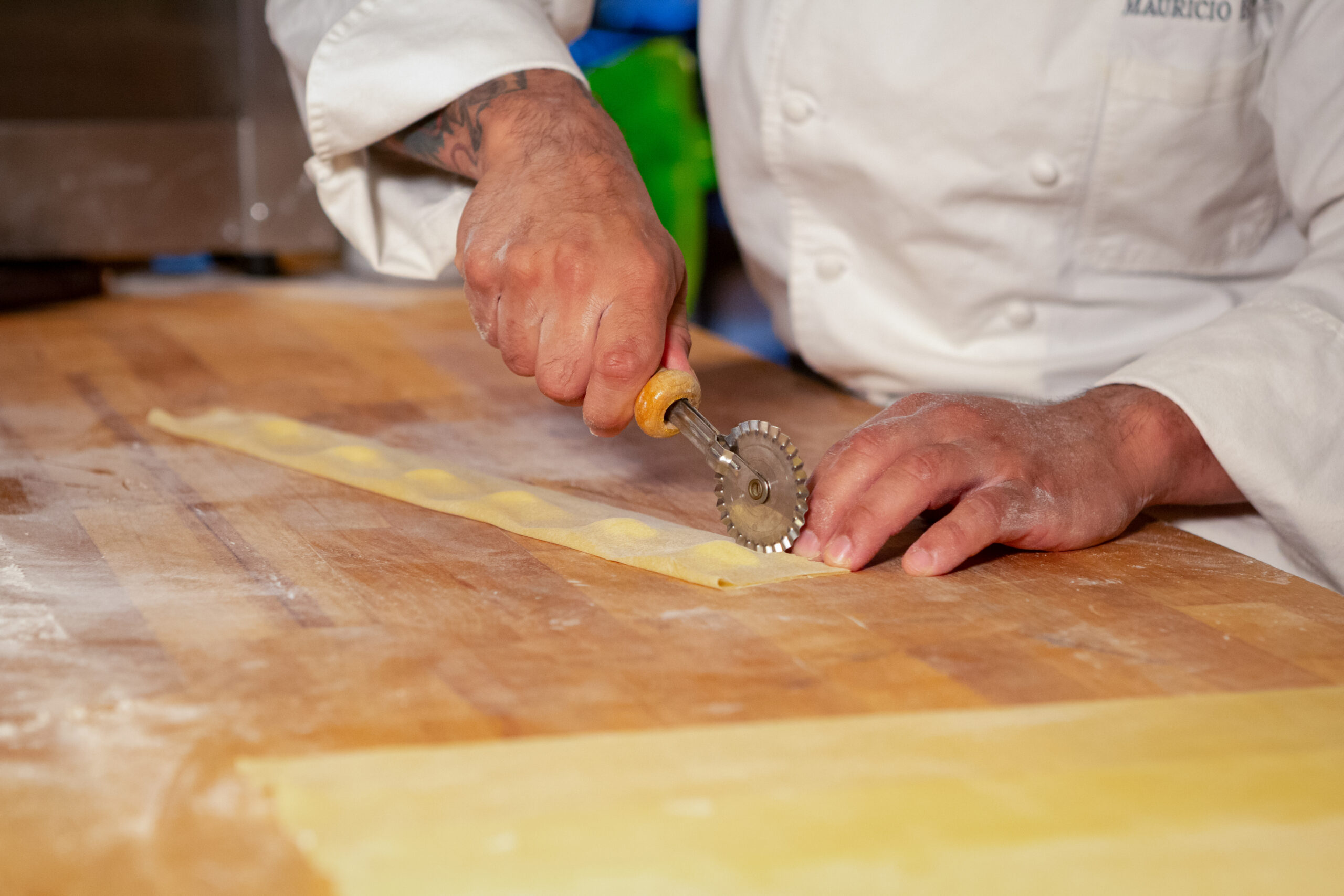 Il Mulino Chef Cutting Ravioli | The Main Street Mouse Il Mulino Chef Cutting Ravioli