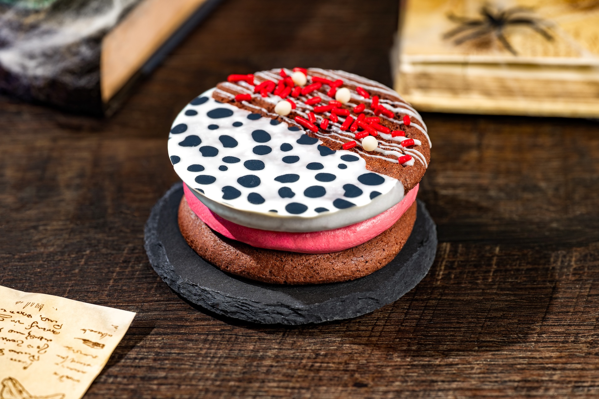 2026WDWMNSSHPFoodieGuideCruellaCookie | The Main Street Mouse 2026 wdw mnsshp foodie guide cruellacookie