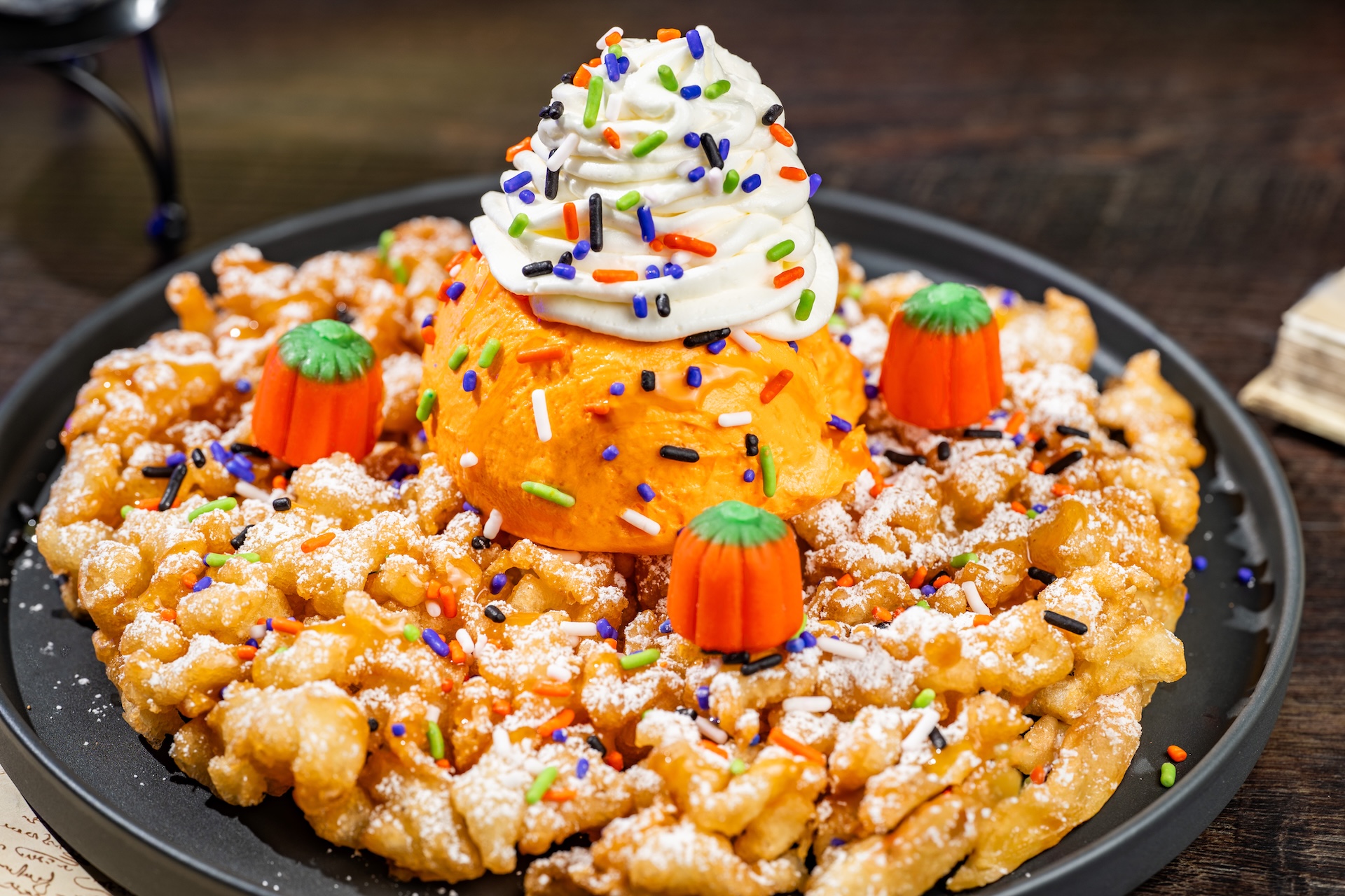 2026WDWMNSSHPFoodieGuidePumpkinFunnelCake | The Main Street Mouse 2026 wdw mnsshp foodie guide pumpkinfunnelcake