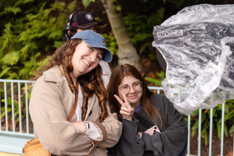 Mirlis Poses with Greta Feldman a Producer Who Helped Film the Advertisement