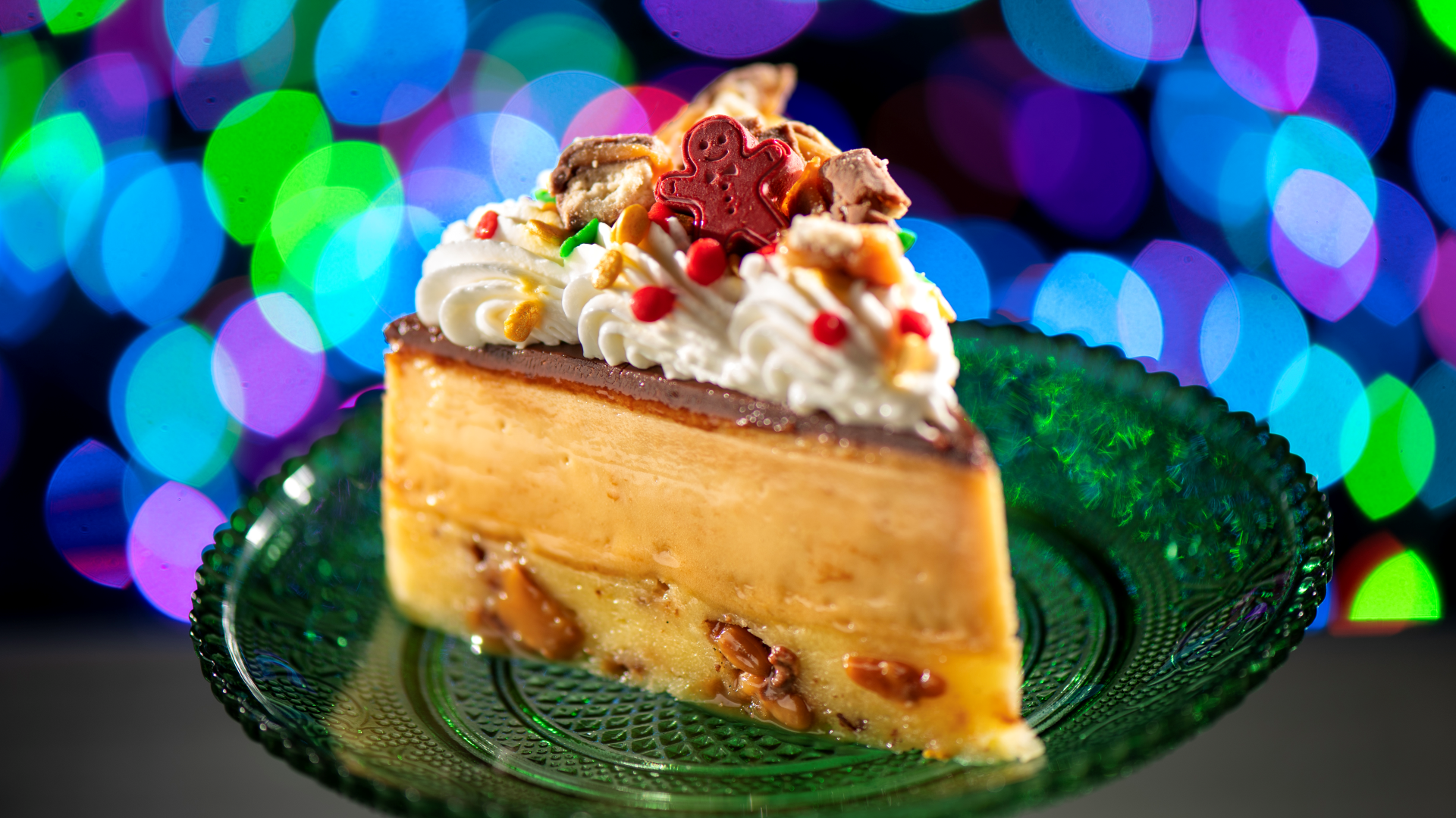 A TWIX on a Classic Pie with a white chocolate gingerbread man at Disney Jollywood Nights | The Main Street Mouse a Twix on a Classic Pie with a White Chocolate Gingerbread Man at Disney Jollywood Nights