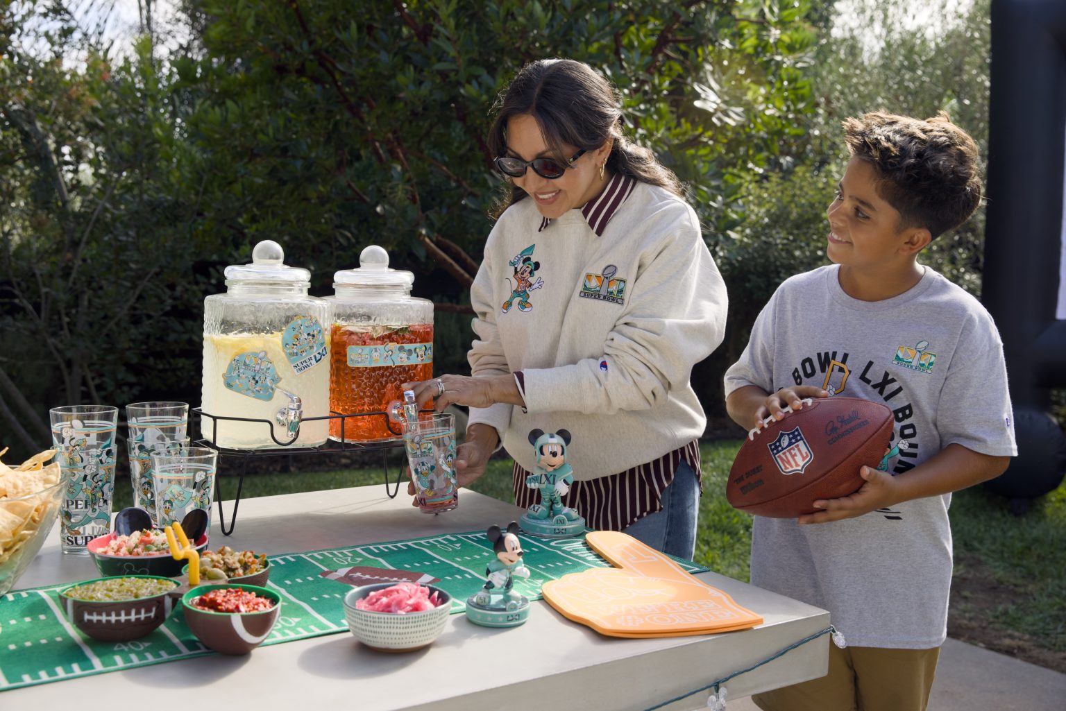 Fans wearing Mickey and Friends NFL apparel | The Main Street Mouse Fans Wearing Mickey and Friends Nfl Apparel