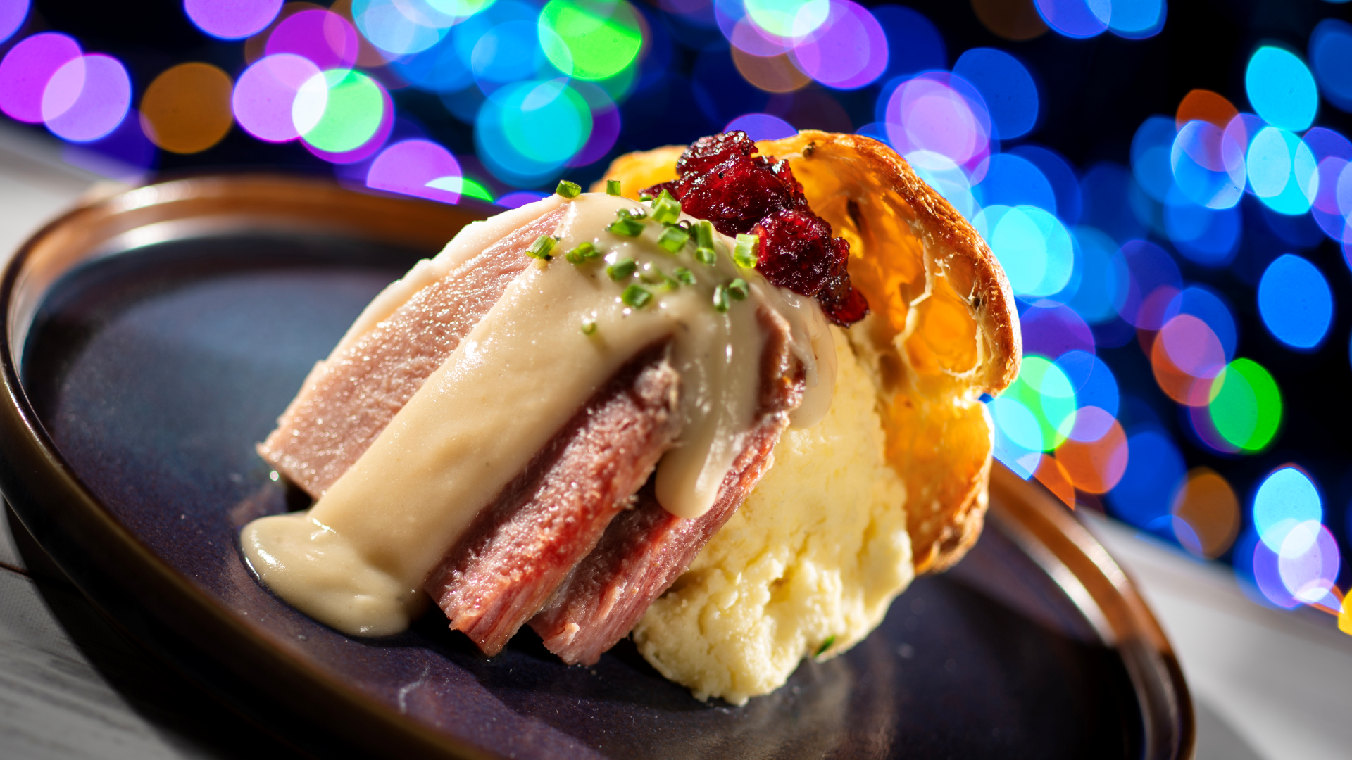Yuletide Ham Popover with ham mashed potatoes and cranberry chutney at Fairfax Fare during Jollywood Nights | The Main Street Mouse Yuletide Ham Popover with Ham Mashed Potatoes and Cranberry Chutney at Fairfax Fare During Jollywood Nights